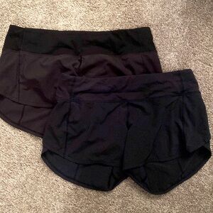 2 pairs LuluLemon running shorts - size 4.  One black, one navy.  Never worn